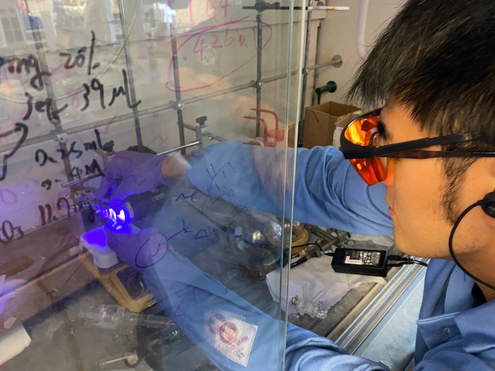 Rice University graduate student Kang-Jie (Harry) Bian sets up light-sensitive molecules for an experiment in the lab of chemist Julian West. Bian is lead author of a study inspired by natural processes to enable the modular difunctionalization of alkene molecules for drug and materials design. 