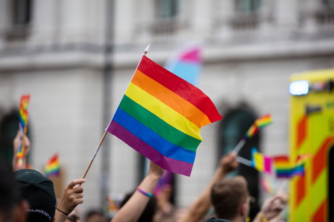 LGBTQ+ flag waving