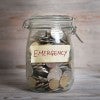 Emergency Savings Jar with coins inside
