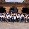 High school students pose with teachers and other sponsors at the Texas Diversity Council Summer Youth Program outside the Rice Welcome Center on the Rice University campus.