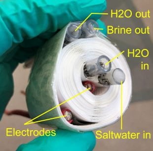 A coiled distillation membrane system for desalinating hypersaline brine. Rolling the system into a coil demonstrated the possibility of adopting a common space-saving, water-filtration format. (Photo by Kuichang Zuo/Rice University)