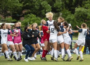 The Owls celebrate after winning the Conference USA Tournament. (Photo by Tommy LaVergne)