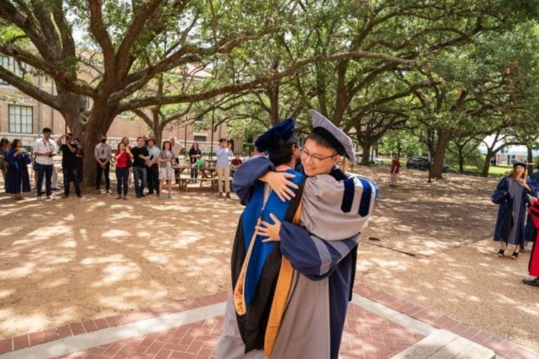 Doctorates Hugging
