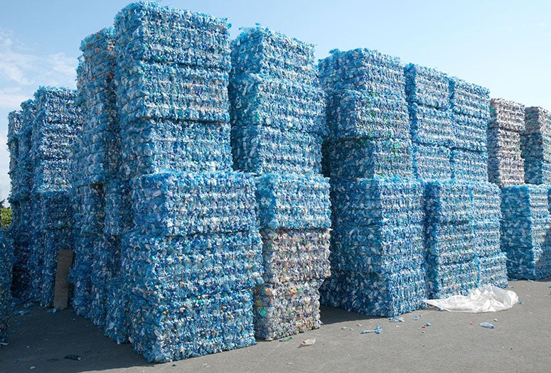 Plastic bottles pressed and packed for recycling