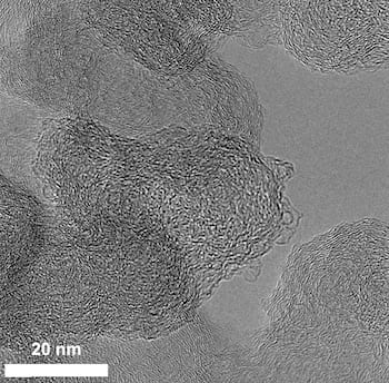 A transmission electron microscope image shows details of carbon black particles after treatment with plasma. Defects in the carbon lattice caused by the oxygen plasma enhance the material’s ability to catalyze the production of hydrogen peroxide, according to Rice University scientists. (Credit: Tour Group/Yakobson Research Group/Rice University)