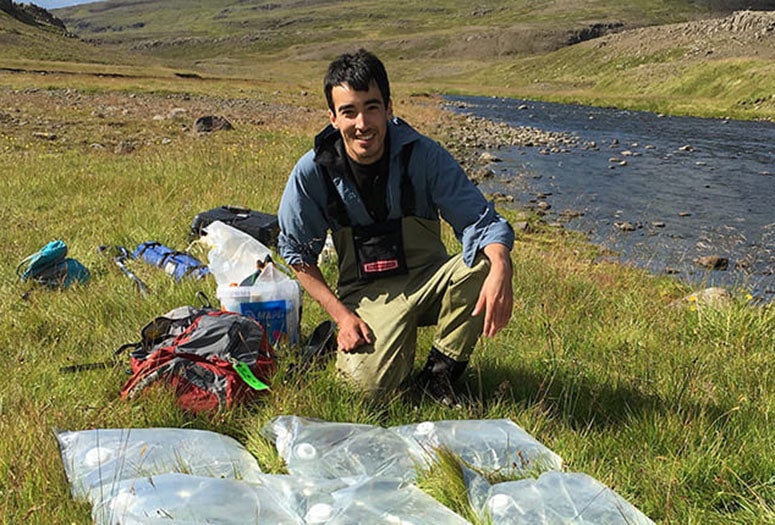 Mark Torres with water samples collected from Iceland's Efri Haukadalsá River in 2016.