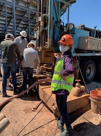 Rice University graduate student Valeriia Sobolevskaia at the on-campus well site being developed to help geoscientists continue development of fiber-optic sensors to find and evaluate small faults at underground carbon dioxide storage reservoirs. Courtesy of the Ajo-Franklin Lab