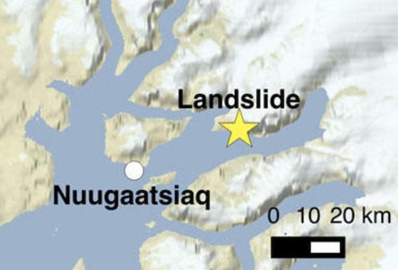 An overview by the U.S. Geological Survey shows the location of the Nuugaatsiaq landslide (yellow star) relative to five broadband seismic stations (pink triangles) within 500 km of the landslide. Nuugaatsiaq (NUUG) was impacted by the resulting tsunami the reached a height of 300 feet at sea, though it was much lower before it reached the village. The inset shows the geometry of the fjords relative to the landslide and Nuugaatsiaq. (Source: USGS)