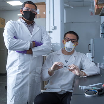 Rice University engineer Gururaj Naik and graduate student Weijian Li have discovered that 2D tantalum disulfide has unique light-handling properties that could be useful for 3D displays, virtual reality and self-driving vehicles. Photo by Jeff Fitlow