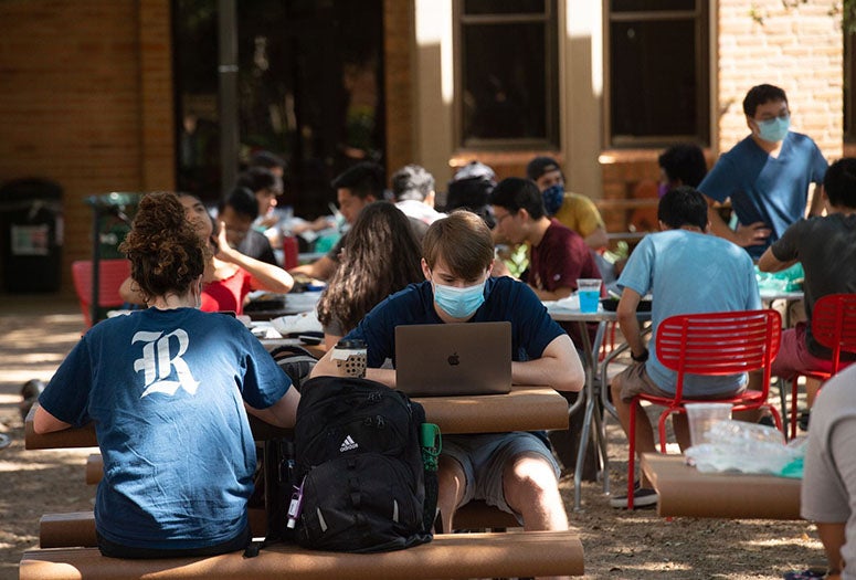 Rice students studying outside. 