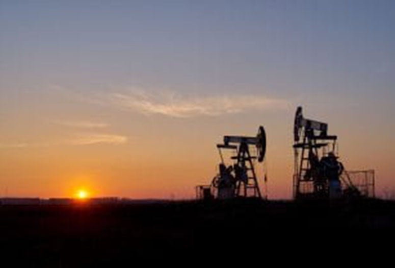 Oil rigs drilling in an oil field. 