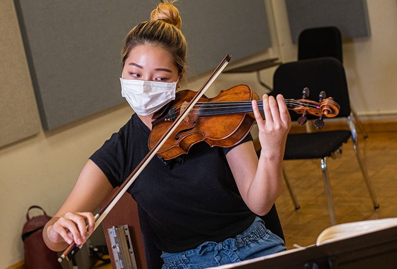 A Shepherd School student rehearses for the virtual Chamber Music Festival. Photo by Jeff Fitlow