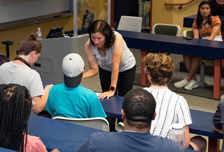 Shannon Walker lecturing to students in Duncan Hall