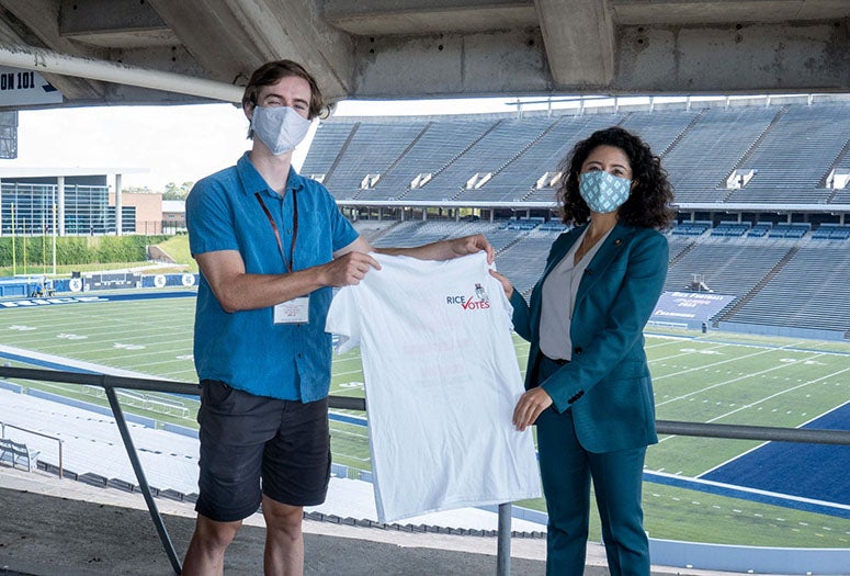Harris County Judge Lina Hidalgo visited the popular polling place in Rice Stadium Oct. 20 and was presented with a “Rice Votes” T-shirt by Hanszen College junior Mason Reece, the election judge for Precinct 361.