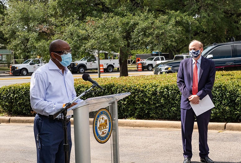 Mayor Turner speaking next to President Leebron
