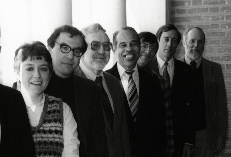 Thomas Freeman posed with the faculty of Rice University’s Department of Religious Studies in a photograph from the 1987 Campanile. L to R: Sylvia Louie, Niels Nielsen, Elizabeth Heitman, Werner Kelber, Clyde Manschreck, Thomas Freeman, Warren Frisina, George Rupp (President of Rice University at the time), Don Benjamin and James Sellers. "Religious Studies Department, Rice University." (1987) Rice University: https://hdl.handle.net/1911/76275.