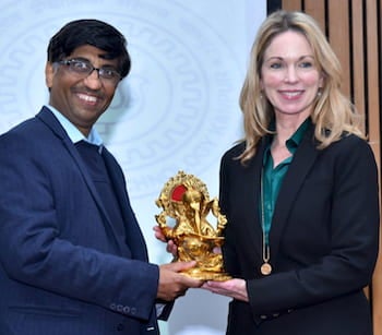 Indian Institute of Technology Kanpur Director Abhay Karandikar presents a gift to Rice University Vice President for Global and Digital Strategy Caroline Levander at the signing. Photo courtesy of the Indian Institute of Technology Kanpur.