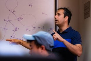 Rice University's Anshumali Shrivastava led a team that demonstrated how to implement deep learning technology without specialized acceleration hardware like graphics processing units. (Photo by Jeff Fitlow/Rice University)