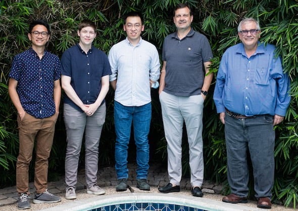 Researchers at the University of Houston and Rice University have identified a possible “Achilles’ heel” in the frustration of amyloid beta peptides as they dock to the fibrils that form plaques in patients with Alzheimer’s disease. From left, Kyle Le, Kaitlin Knapp, Yuechuan (Alex) Xu, Peter Vekilov and Peter Wolynes. Missing from the photo are co-authors Nicholas Schafer, Aram Davtyan and Mohammad Safari. (Credit: Jeff Fitlow/Rice University)