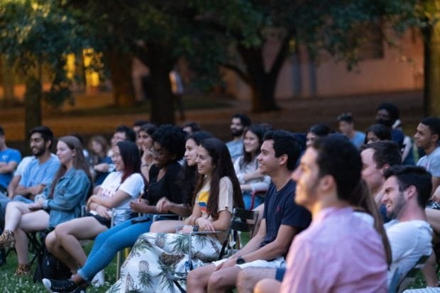 Students enjoying a stand-up show