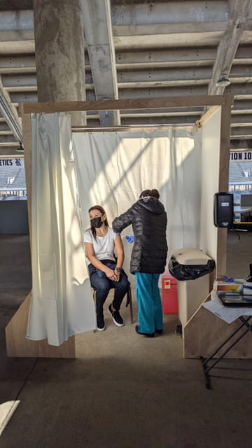 Woman receiving a vaccine
