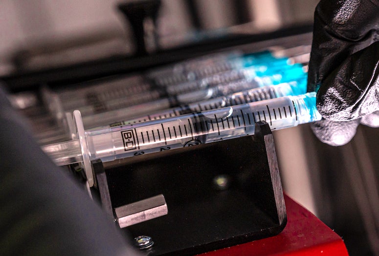 Rice University bioscientists have developed a microfluidic platform for high-throughput studies of how bacteria evolve antibiotic resistance. One syringe of a solution containing bacteria or an antibiotic can provide millions of microspheres for analysis. 