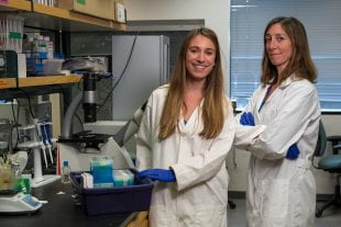 Rice University's Lauren Howe-Kerr (left) and Adrienne Correa are part of a research team that found it may be possible to predict how well a coral will tolerate the stresses of climate change by examining the team of symbiotic algae living inside it. (Photo by Brandon Martin/Rice University)