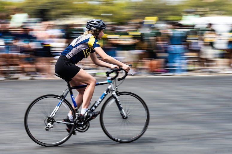 Cyclist from Lovett College racing during Beer Bike 2022