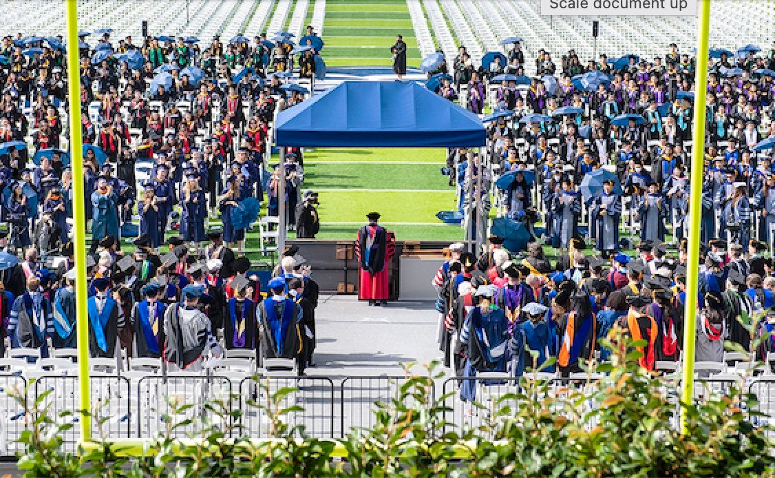 All degree candidates were invited to attend the May 7 plenary commencement ceremony in Rice Stadium on a warm Saturday morning, many sporting umbrellas for the sun rather than rain.