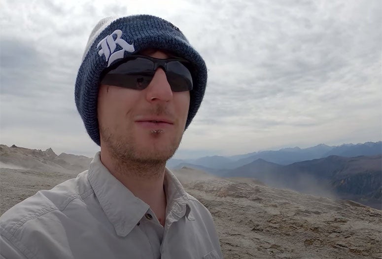 Rice Ph.D. student Patrick Phelps atop Chile's Cordon Caulle volcano in March 2022