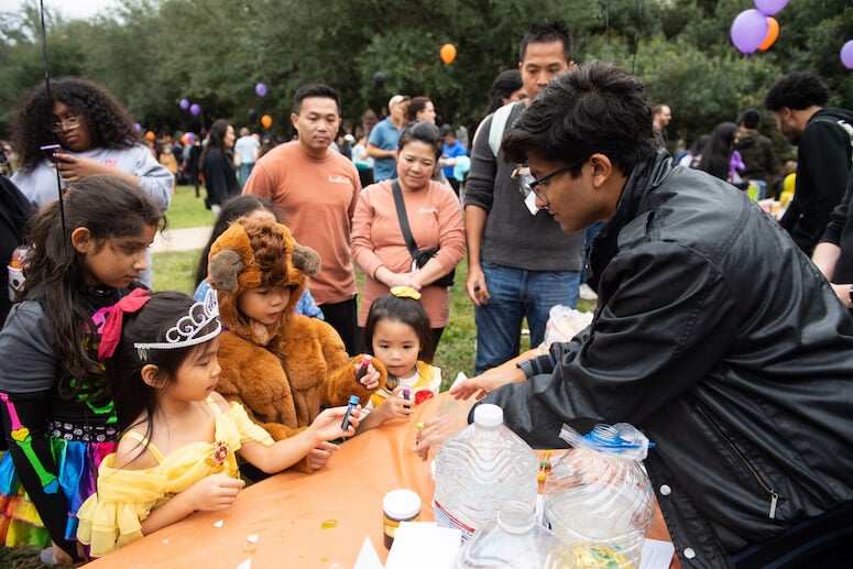 Families from nearby neighborhoods at Rice for Project Pumpkin