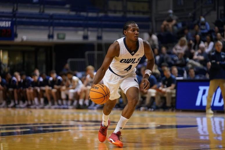 Rice junior guard Quincy Olivari handles the ball against Florida International University on Feb. 11, 2023. (Photo by Rice Athetics)