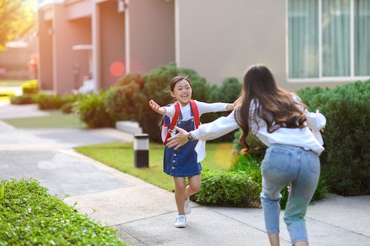 Child hugging mother