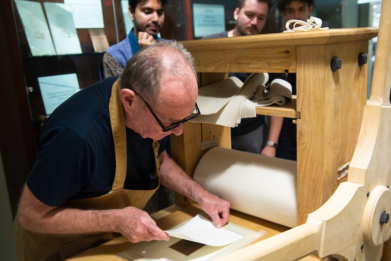 Renowned William Blake scholar and printmaker Michael Phillips demonstrates how to use the star-wheel copper-plate rolling press replica that is now in the Woodson Research Center in Fondren Library as of March 1, 2023.
