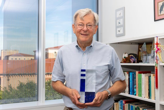 Peter Hartley with award