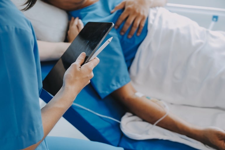 Patient in hospital bed