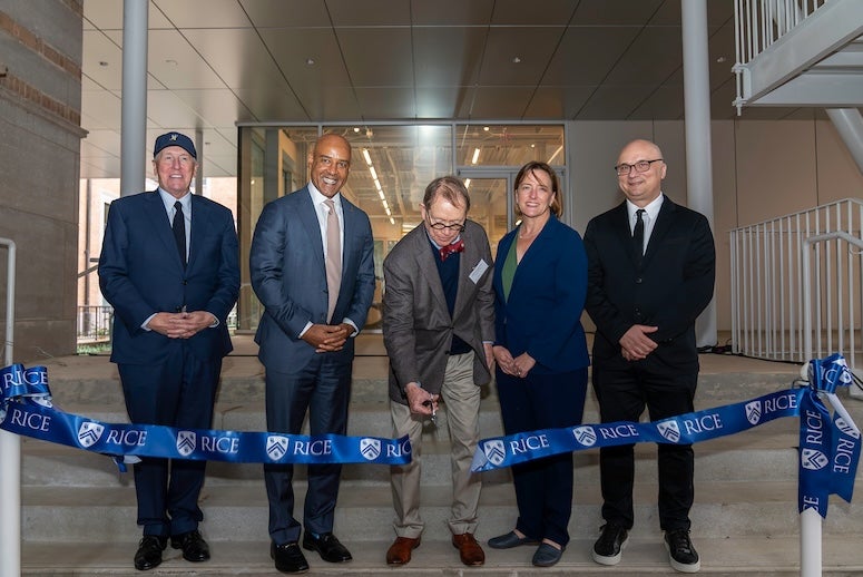 Robert T. Ladd, Reginald DesRoches, Amy Dittmar and Igor Marjanović pose as William T. Cannady (middle) cuts the ribbon to dedicate William T. Cannady Hall.