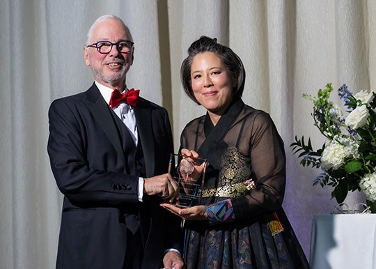 Eugene Keilin accepting his award