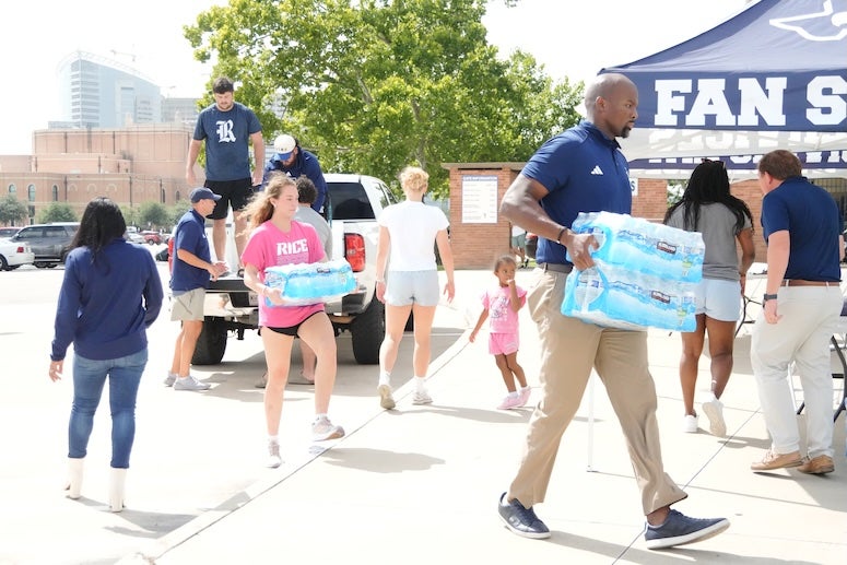 Rice student-athletes and staff load donations at the Brian Patterson Sports Performance Center as part of a two-day flood relief drive supporting Central Texas communities.