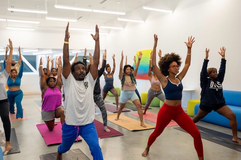 Rice yoga instructor Alicia Stephenson leads a yoga session at the Moody Center.