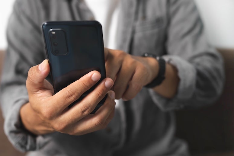 Person on phone stock image