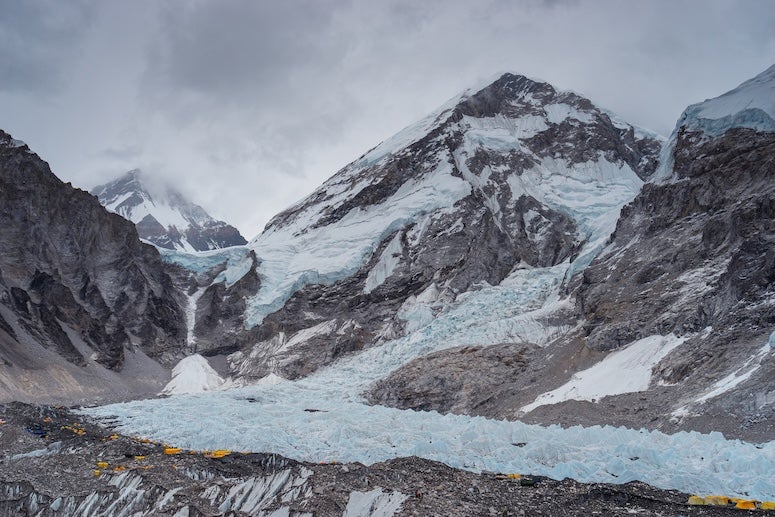 Campsite at Everest base camp surrounded by Himalaya mountains range, Nepal, Asia