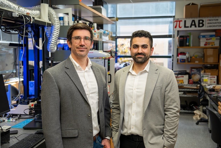 Preston and Rasheed in Preston's lab