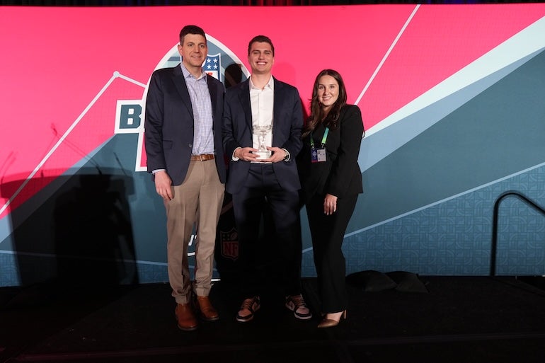Rice University senior Lucca Ferraz (center) receives recognition for winning the 2026 NFL Big Data Bowl, highlighting the growing impact of Rice’s sport analytics program.