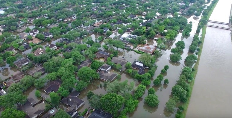 Floodwaters surround homes in the Meyerland neighborhood following the April 2016 Tax Day flood in Houston.