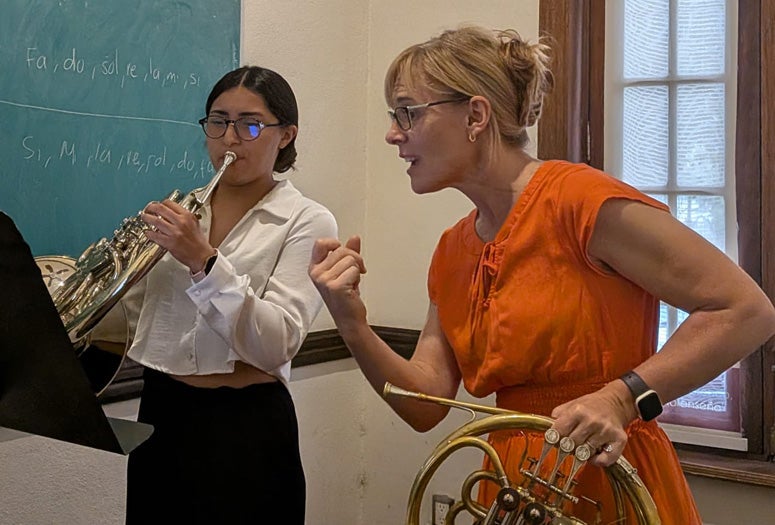 Horn professor Elizabeth Freimuth works with a student at the CAYO workshop in Mexico