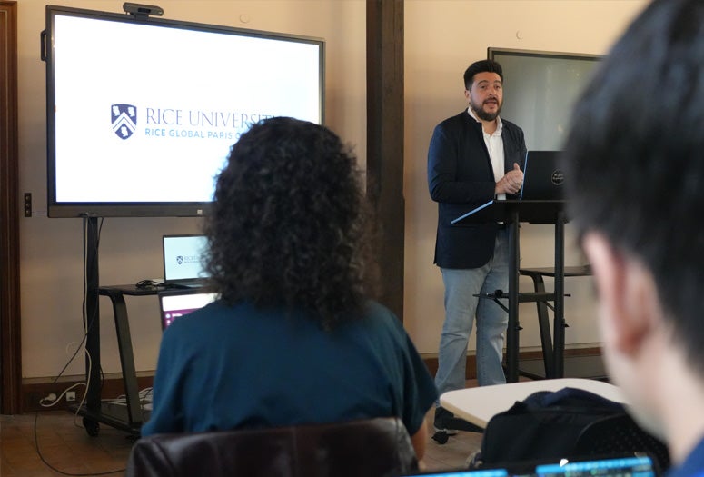 Rodrigo Ferreira speaking at the Human Flourishing in the Age of AI conference