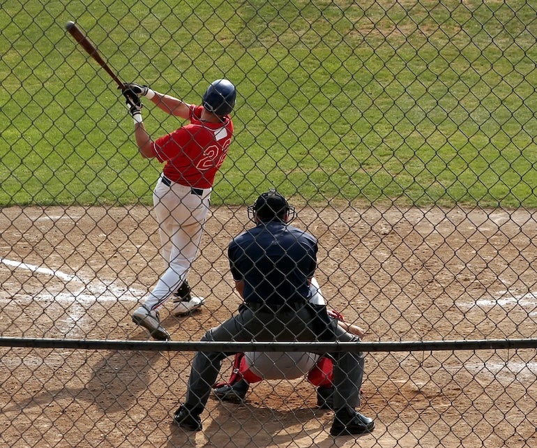 Athletes playing baseball 