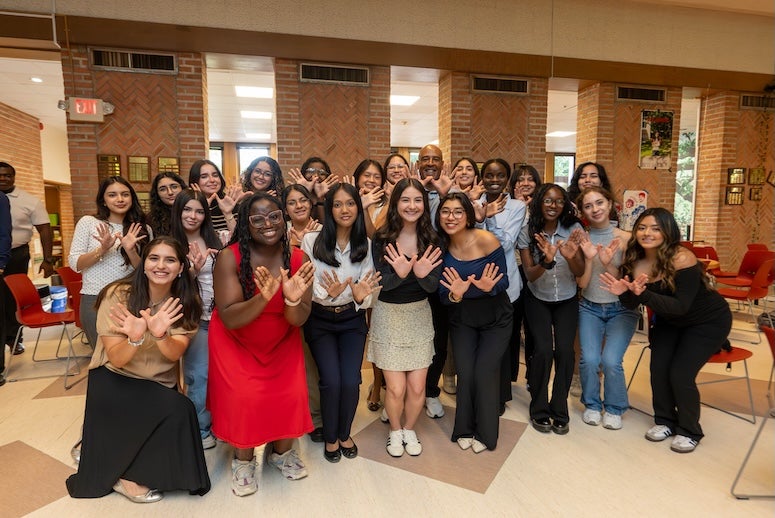 RESP students pose with Rice President Reginald DesRoches
