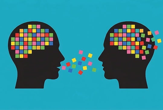 stock image depicting two human heads in silhouette with colorful squares